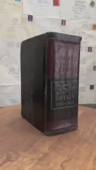 Schrödinger's Escape Plan.  Altered Book / Book Carving Schrödinger's Cat